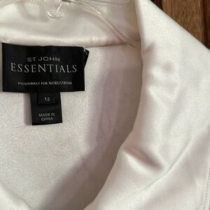 Gently used St. John essentials size 12 blouse with rhinestone buttons